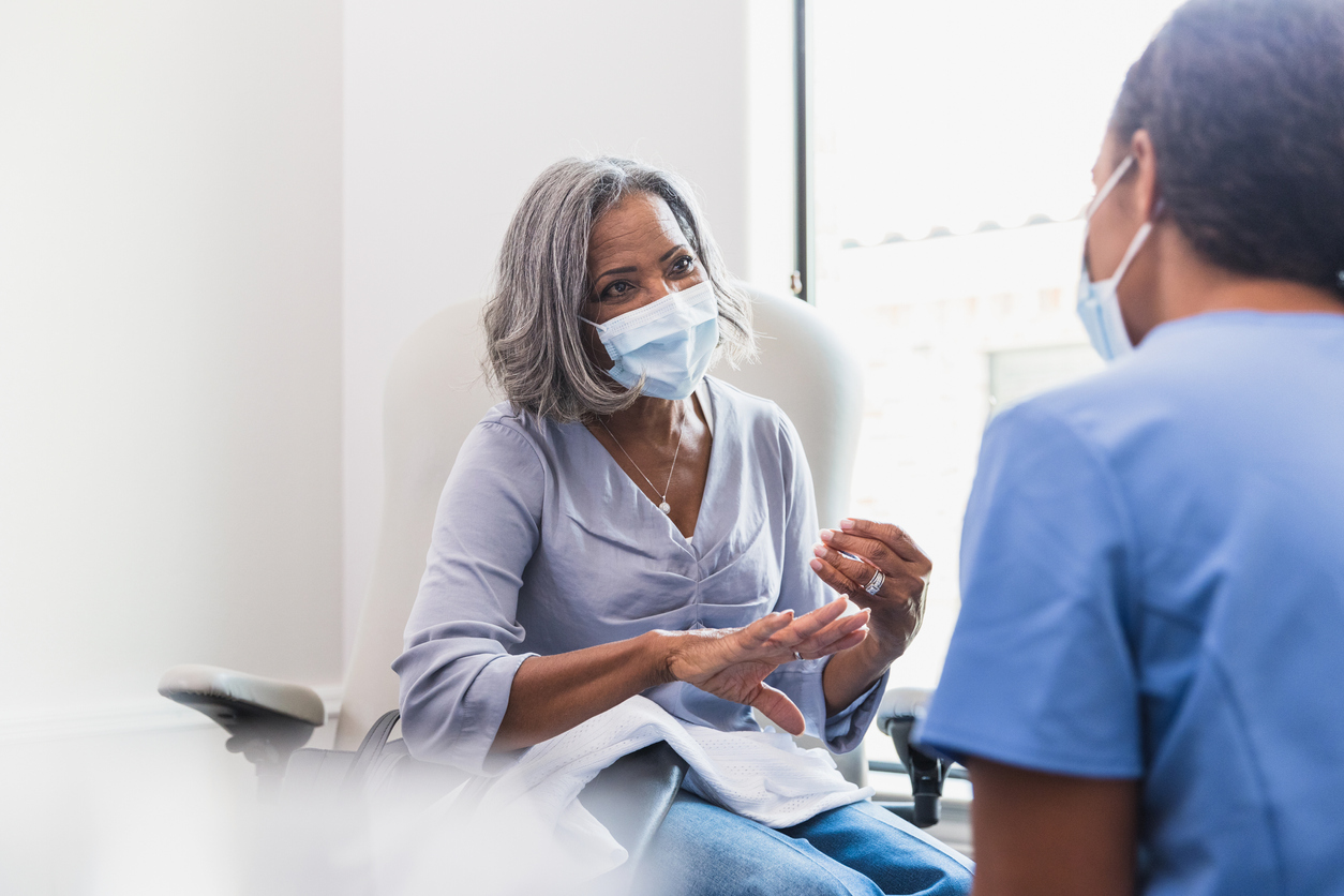A clinician discussing treatment options with a patient